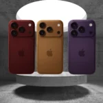 Apple iPhone 18 Pro Max concept in red, gold, and purple colors with triple camera setup displayed on a circular platform.