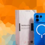Infinix Note 60 Pro smartphone in blue color with retail box, charger, and earphones displayed on a colorful background.