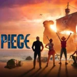 Promotional image for Netflix's One Piece Season 1 showing the Straw Hat Pirates standing on a beach at sunset, facing the Going Merry ship with its iconic Jolly Roger sail glowing against the horizon.