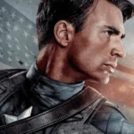 Captain America (Steve Rogers) in profile view with a serious expression, wearing his suit, against a faded American flag background.