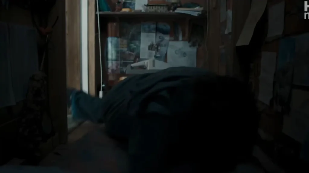 Motion shot inside the cramped cupboard under the stairs as Harry quickly gets up from his bed.